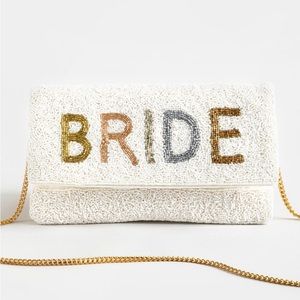 Francesca’s beaded bride clutch with gold chain strap